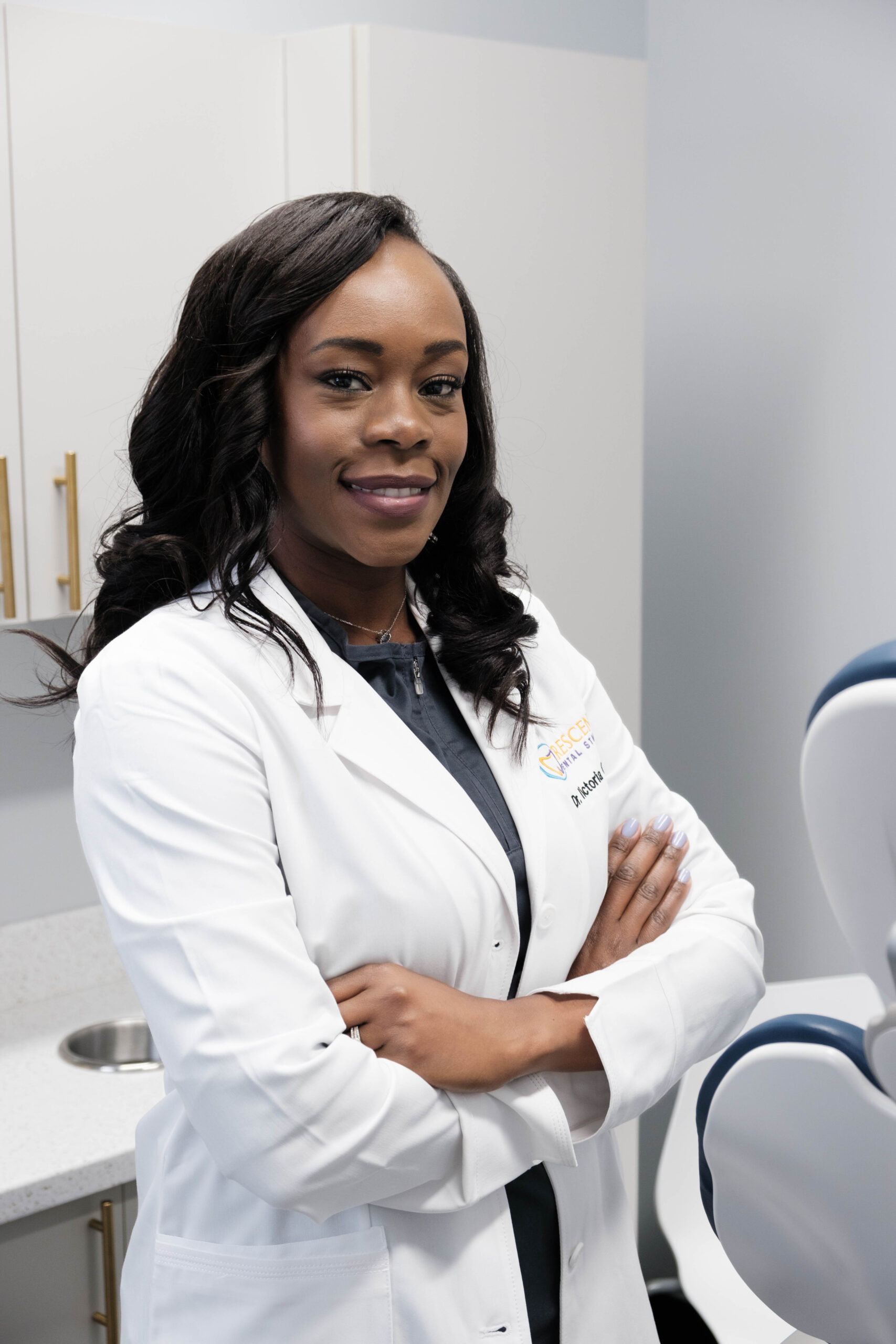 Dr. Crow standing in dental exam room